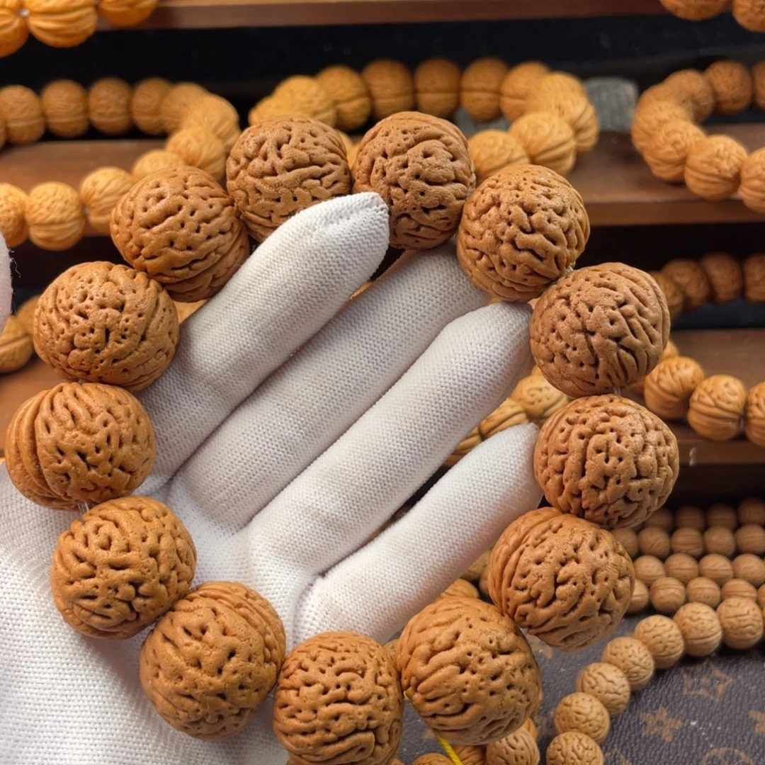 S***l吊坠桃核火山纹精品