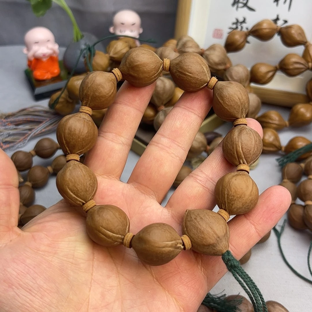 @***鹏橄榄核手串20蜜桃臀