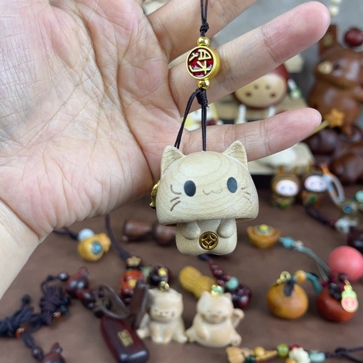 胖***儿实木躲猫猫挂件一个