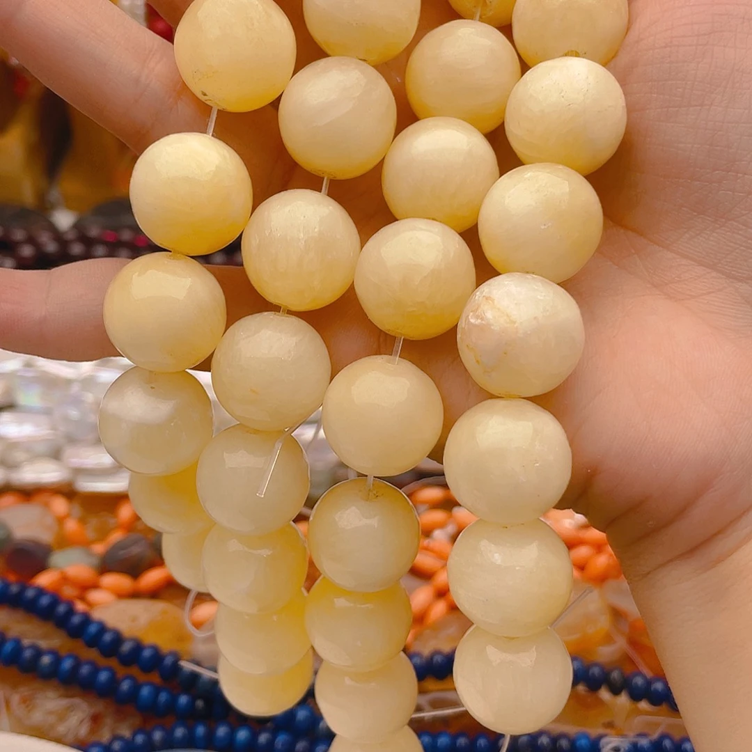 玛瑙/玉髓珠宝半成品未镶嵌米黄玉40颗有瑕