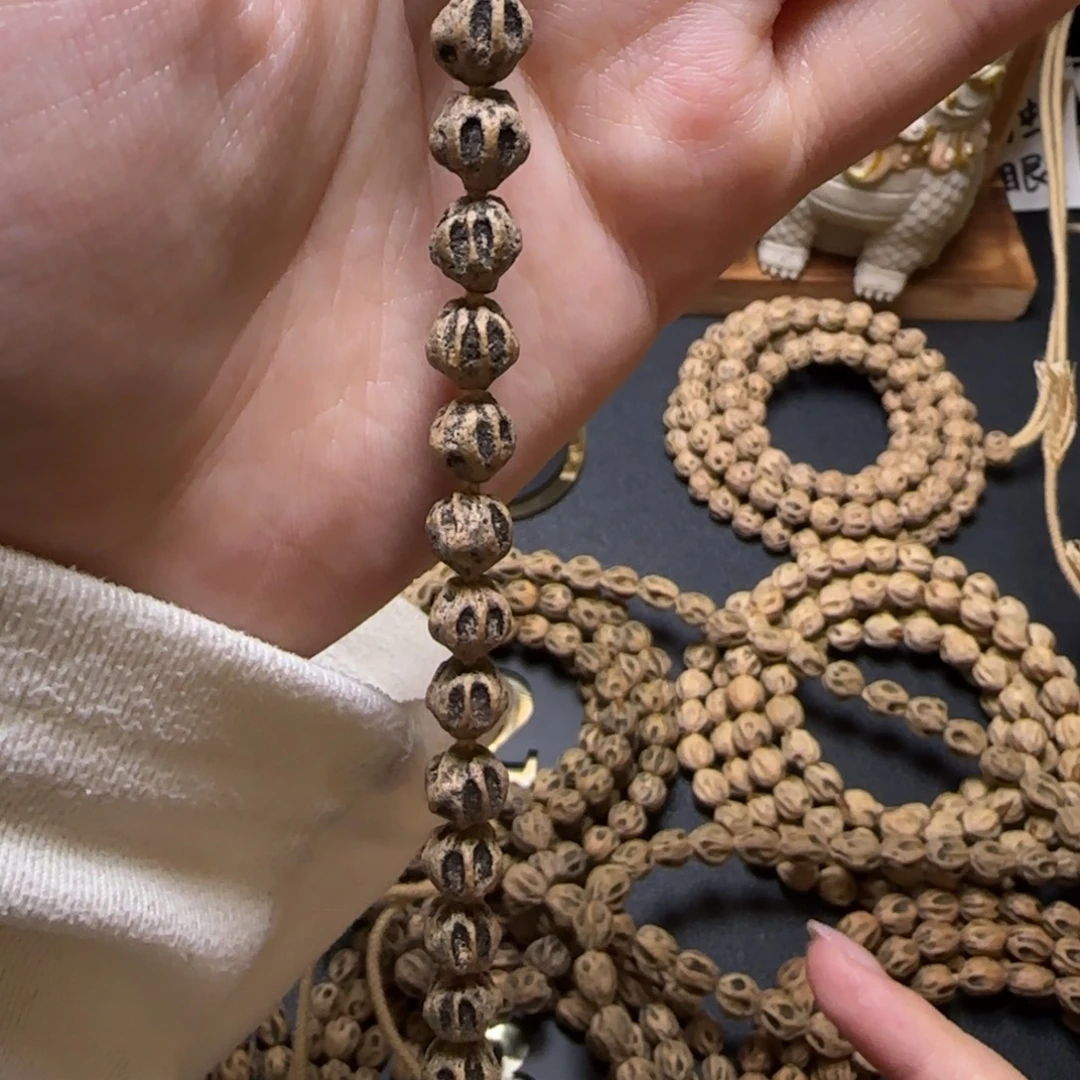 蠡***子柏香籽/百香籽吊坠