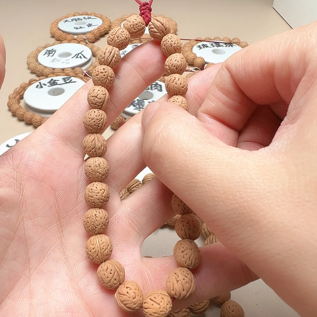 桃核手串0.9小元宝钱袋子