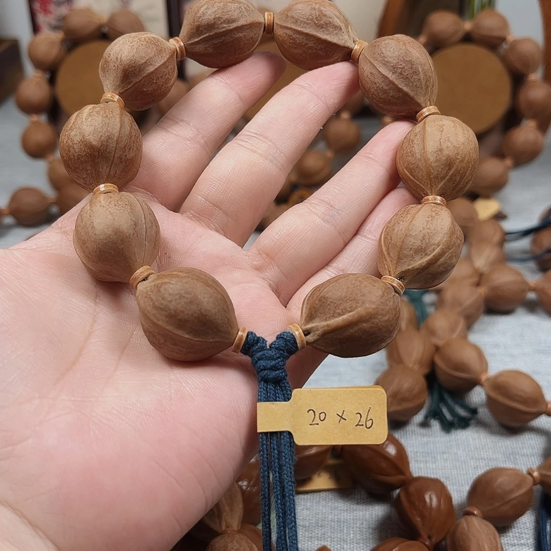 洋***葱手串橄榄核梅林铁核20.26橄榄核