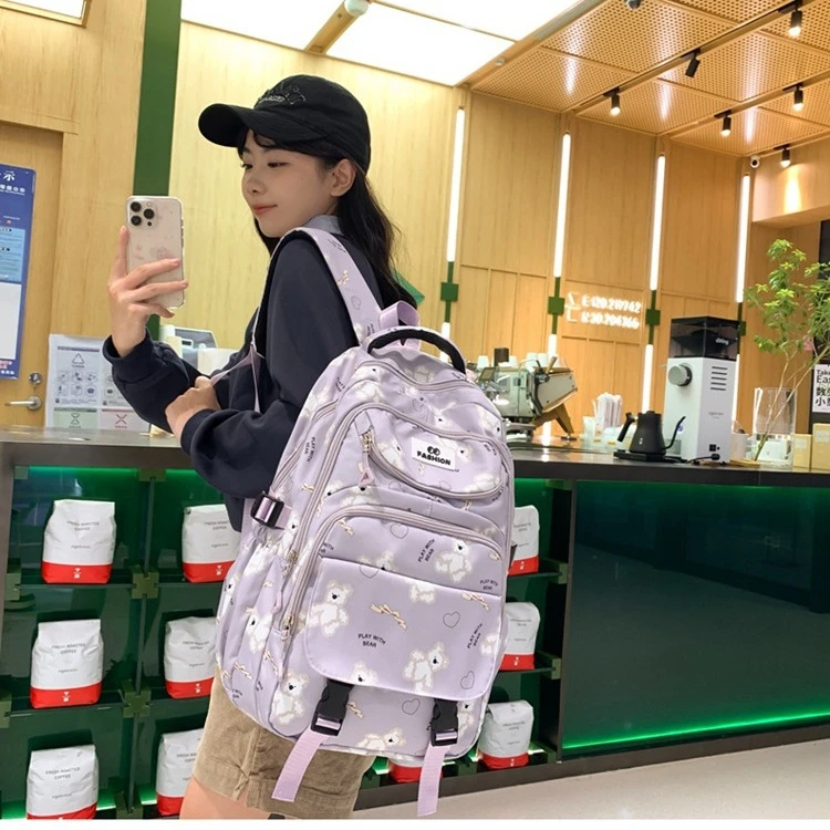 新款蝴蝶结小熊双肩包大容量初高中学生书包出行时尚背包