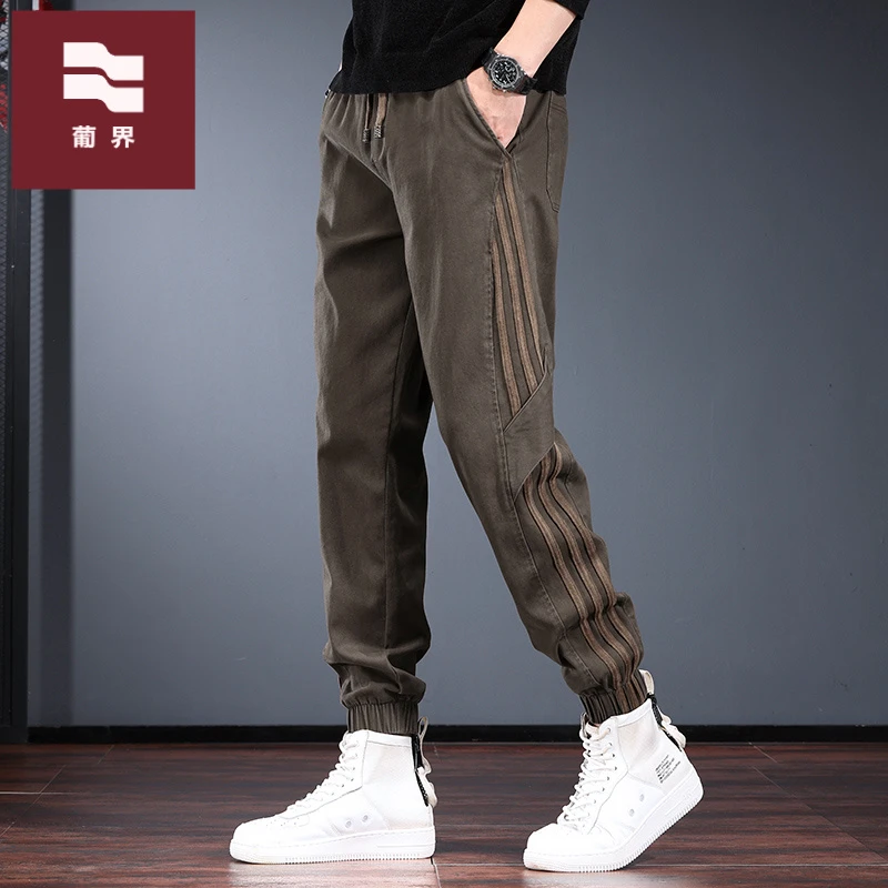 咖啡色宽松束脚休闲裤男秋季美式复古侧边条纹松紧腰工装哈伦裤潮