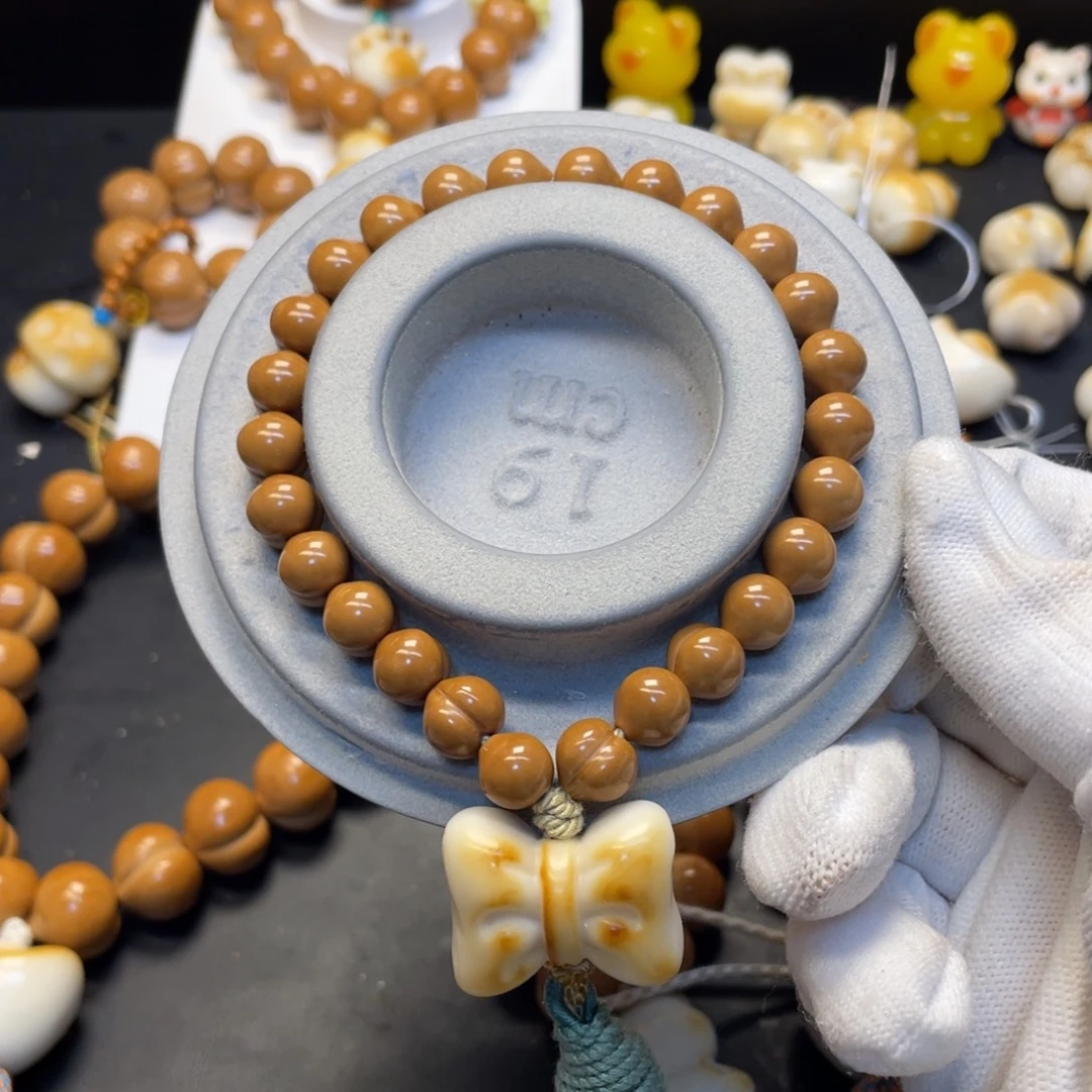 周****猴头核桃吊坠全品屁桃