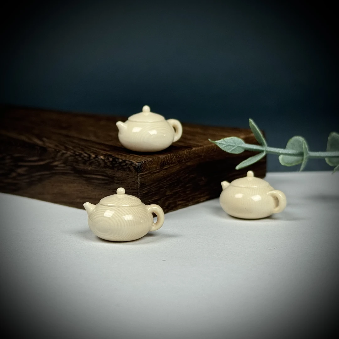 A229-O天然猛犸 雕刻把把壶 约23*14mm随机一个支持鉴定假一罚十