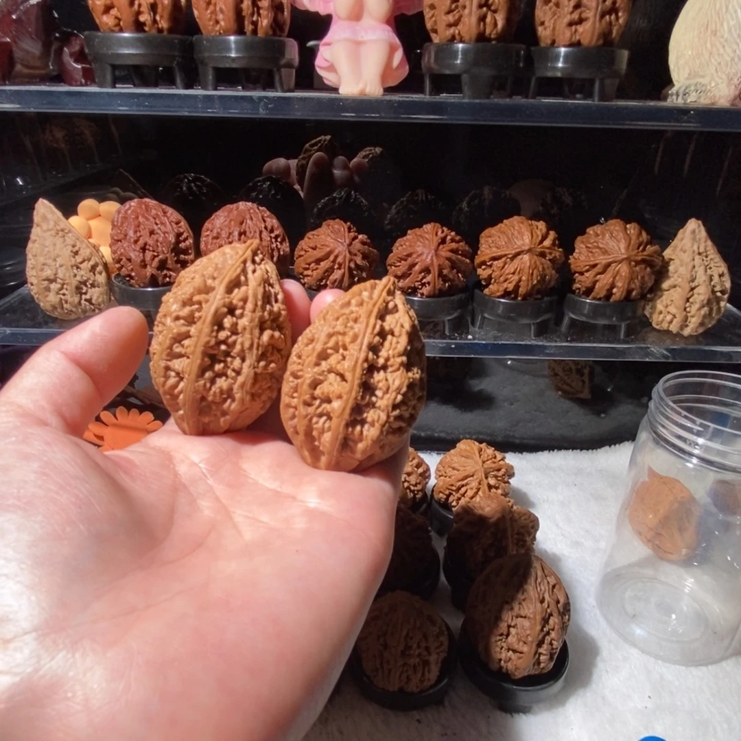 机***梁文玩核桃把件金梭子