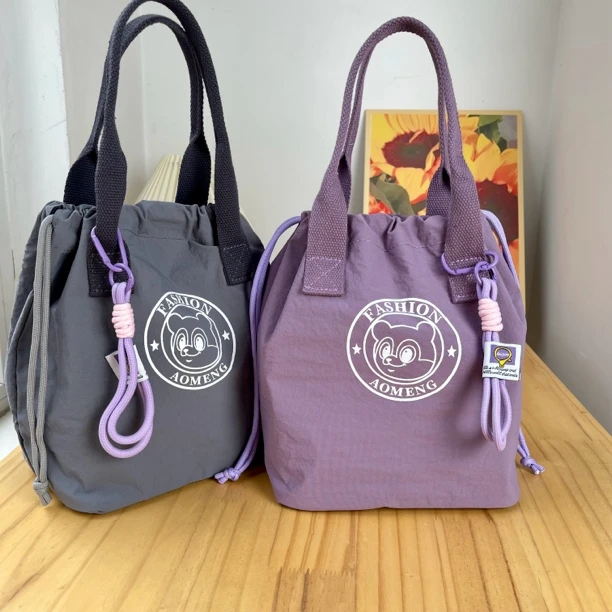 通勤风上班族饭盒包百搭水桶休闲抽绳手提包便携式2508