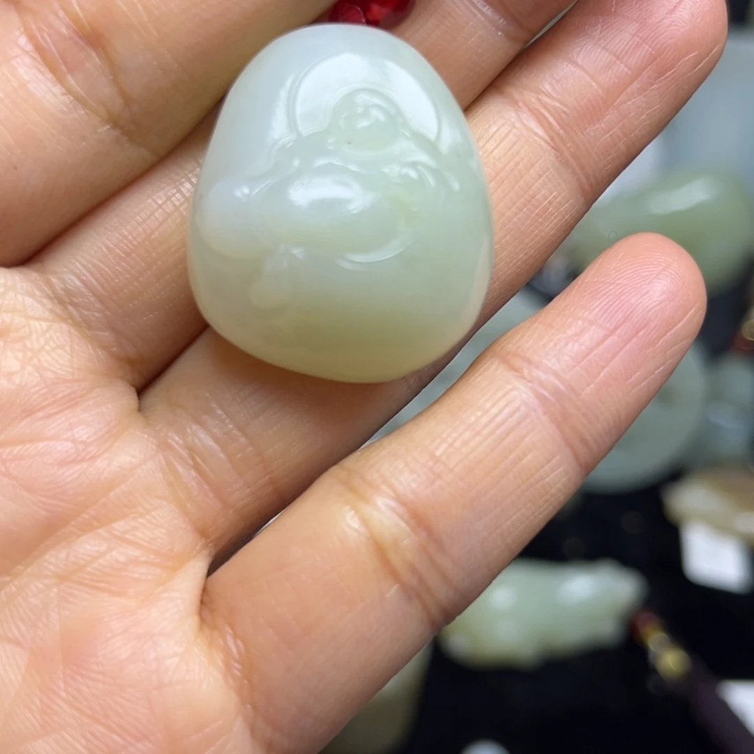 忠***耳和田玉未镶嵌吊坠(不含链)