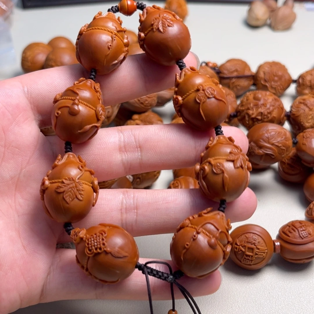 自***息橄榄核手串福禄万代