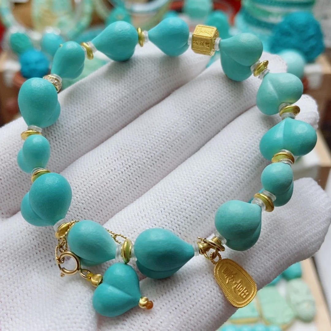 绿松石18K金镶嵌屁桃手串