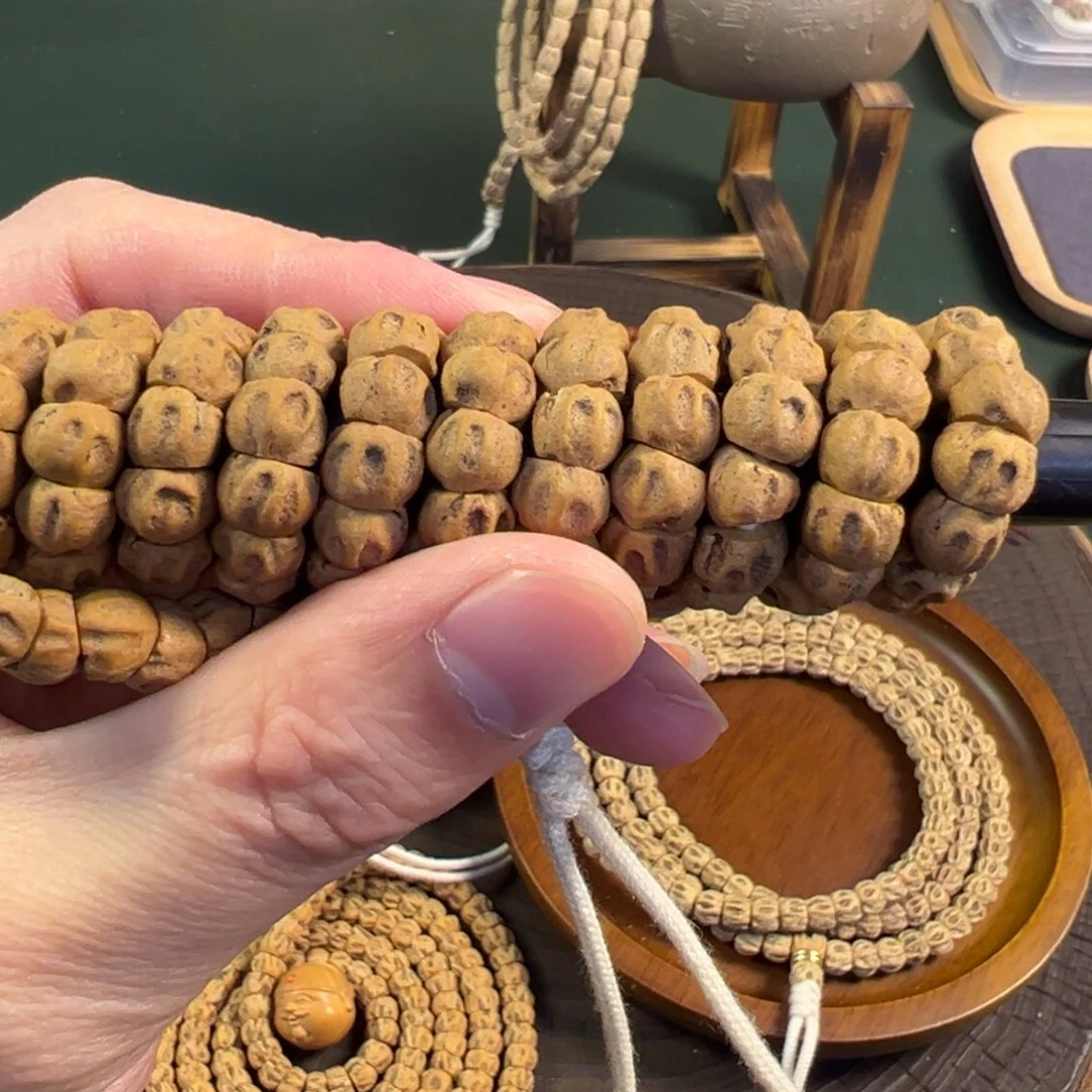 【闪购商品】柏香籽/百香籽吊坠热振双坑对眼大肠7.7尺寸