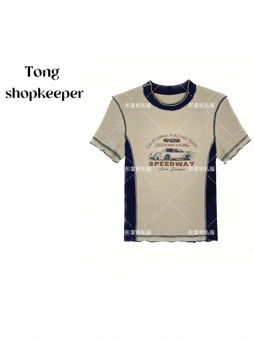 QJ/彤掌柜1681658 夏季25新款天.丝莱赛尔印花拼色显瘦设计上衣