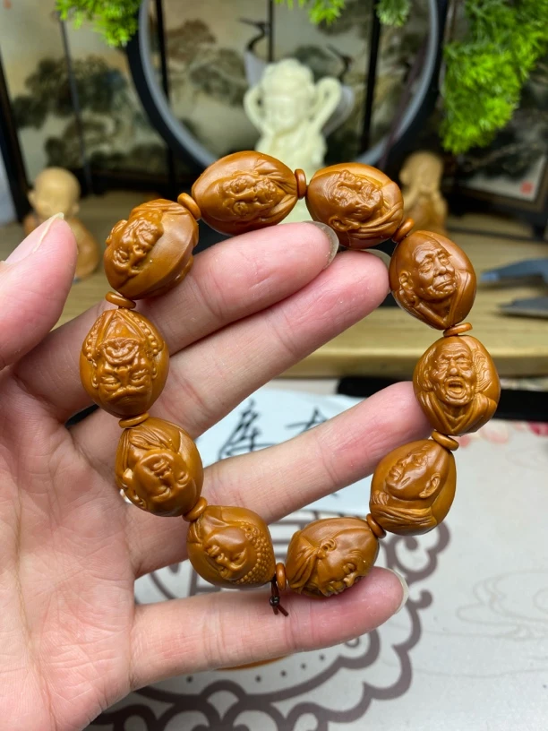 橄榄核雕工艺手串宇三丰罗汉宇