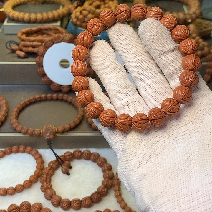 硕***哒桃核手串秦岭龙纹