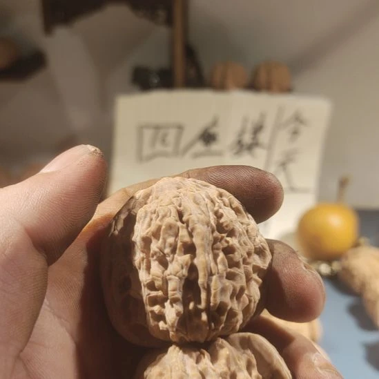 A***a核桃文玩核桃四座楼狮子头手把件