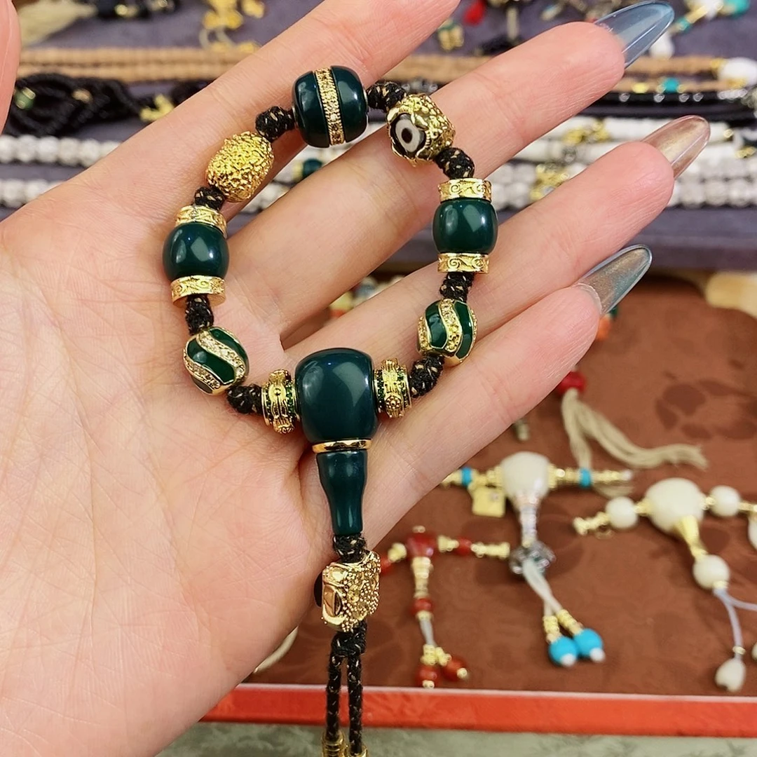 琉璃/树脂/塑料类墨绿色雪巴圈套