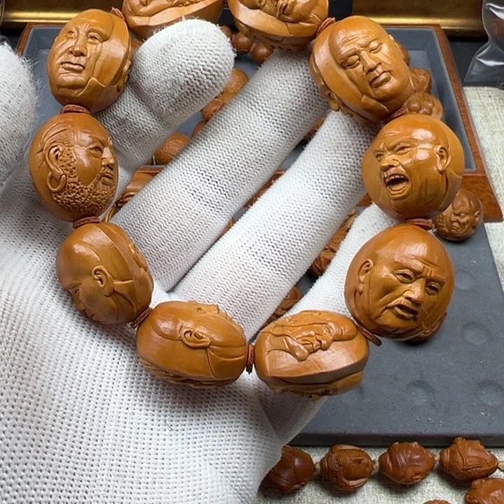 橄榄核手串苏*球橄榄核雕工艺制作