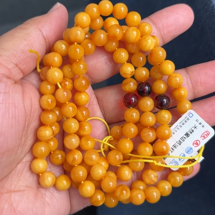 琥珀未镶嵌珠宝奇石M57号6.8+鸡油红多圈