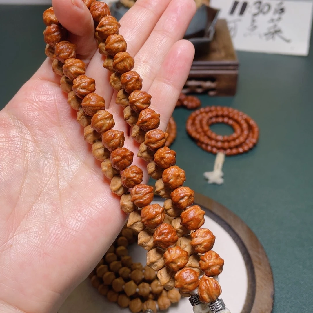 柏香籽/百香籽吊坠白牙横打手持