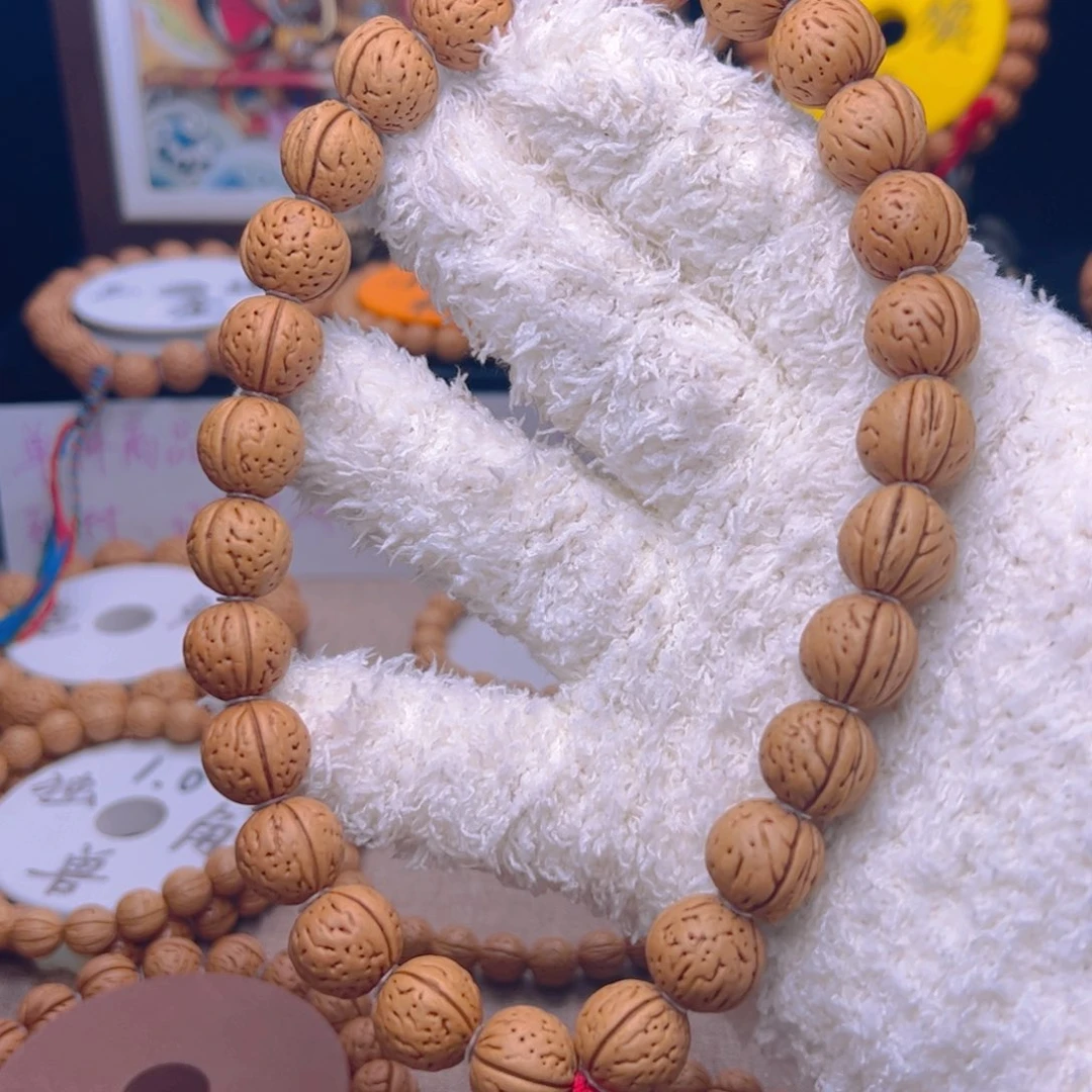 桃核手串杀****?1.4肉脐大手持