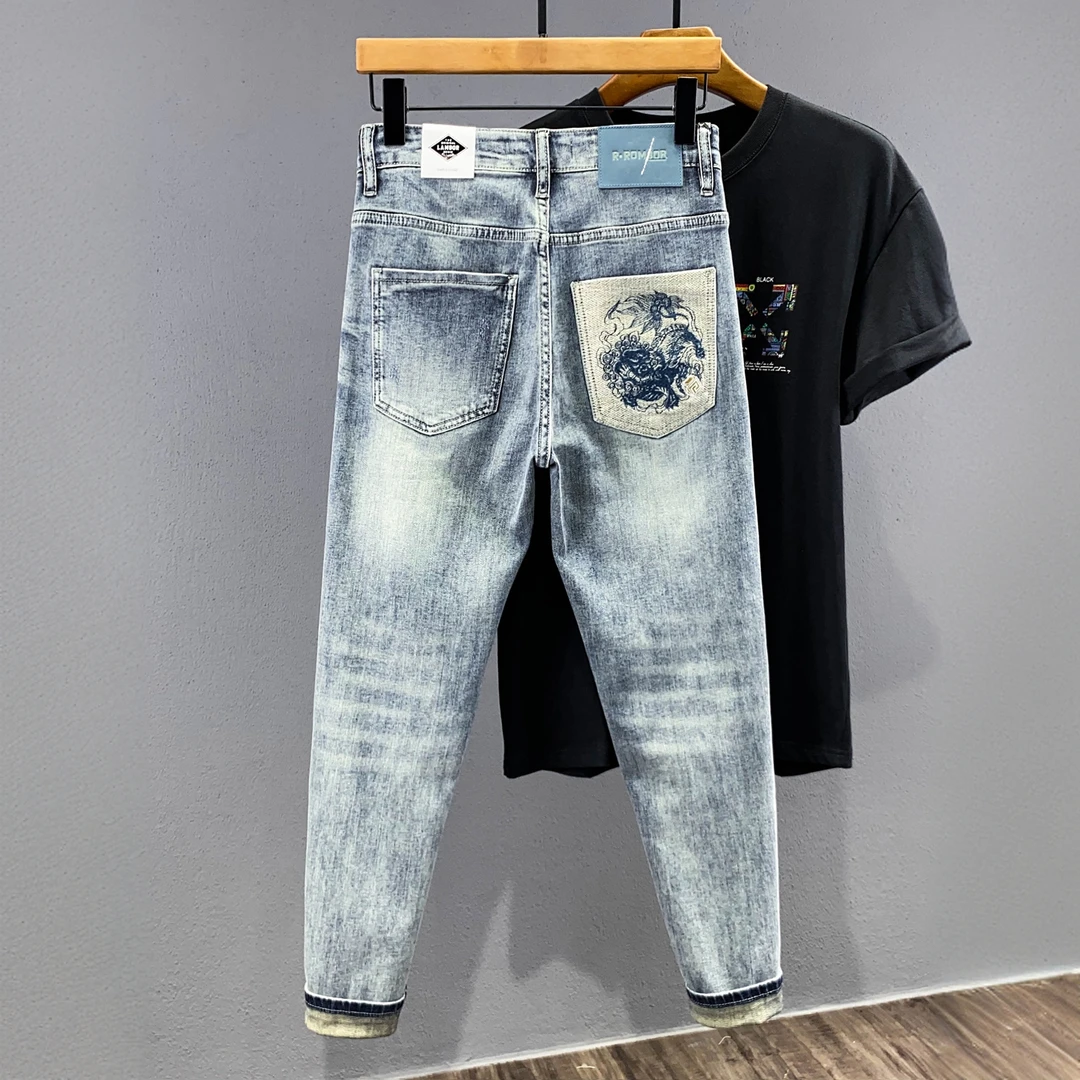 卢密洛布登夏季薄款刺绣浅蓝九分牛仔裤男潮破洞缝补修身小裤韩版