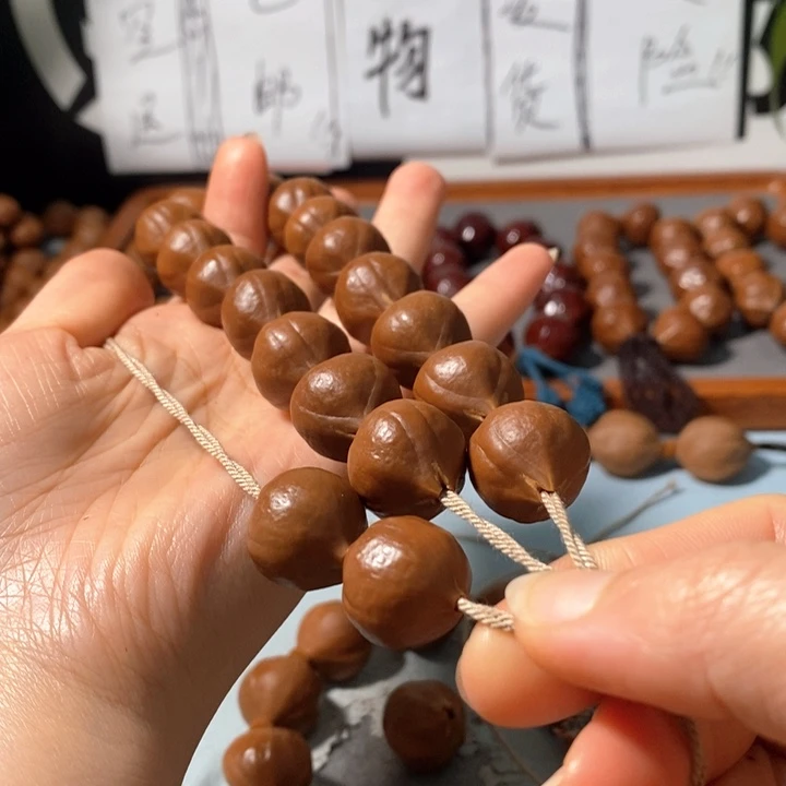 橄榄核手串9171精品蒜头铁核鸡血红16+2颗