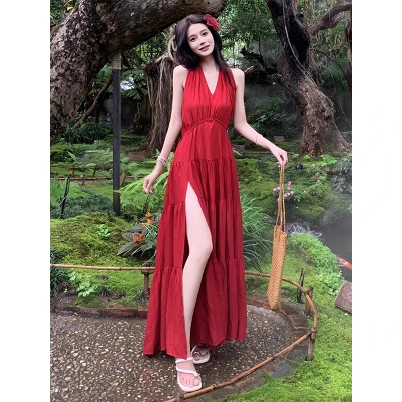 纯欲辣妹不规则绑带挂脖连衣裙2025春季新款修身显瘦露背开叉长裙