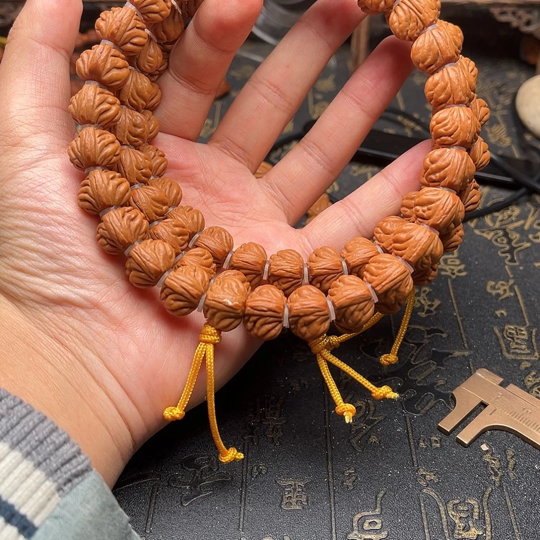 桃核吊坠双龙手持