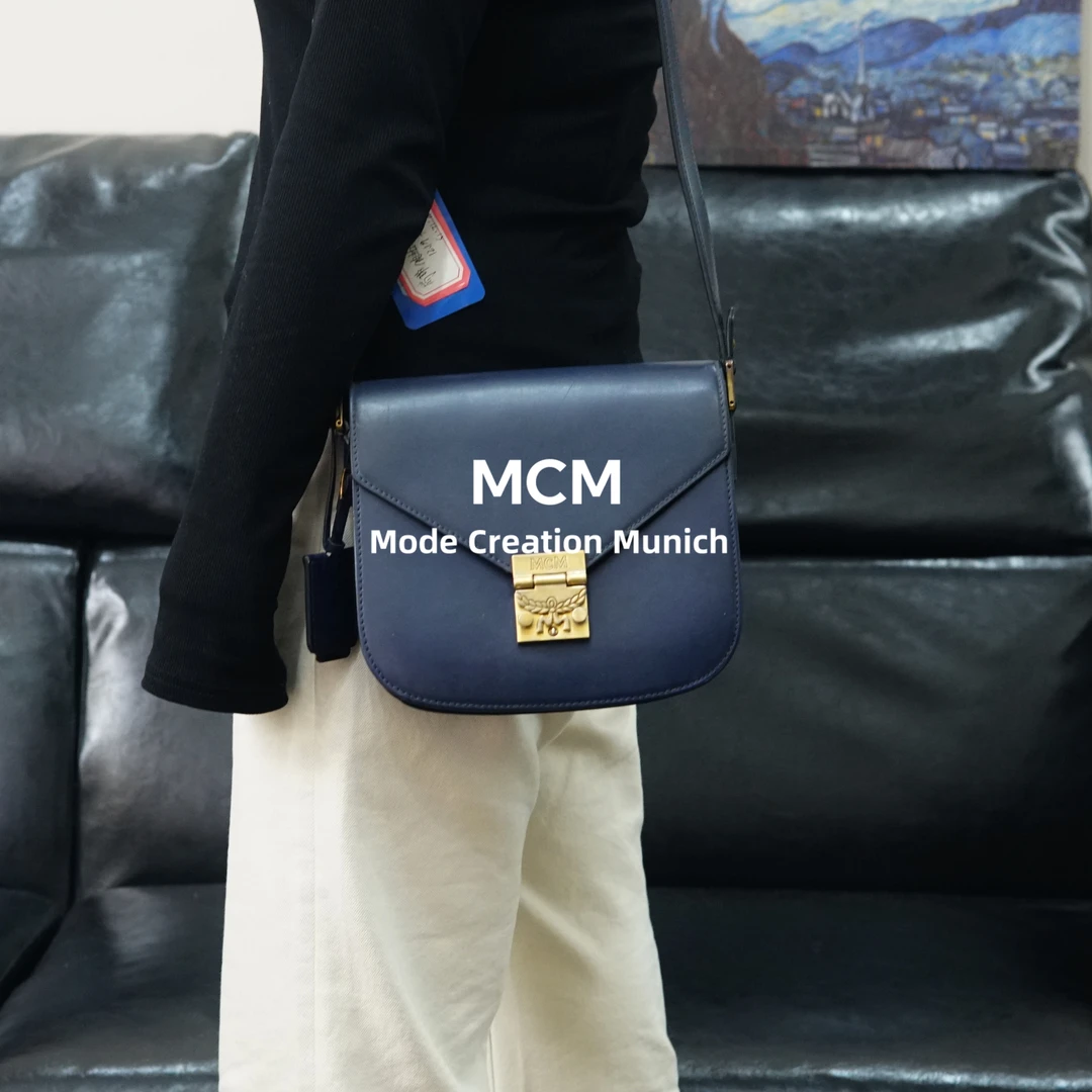 95新 MCM 紫色斜挎包/SD12413024/3024