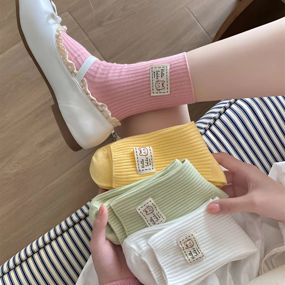 j春夏双针袜子女原创猫咪布标中筒袜早春穿搭ins纯色透气吸汗棉袜
