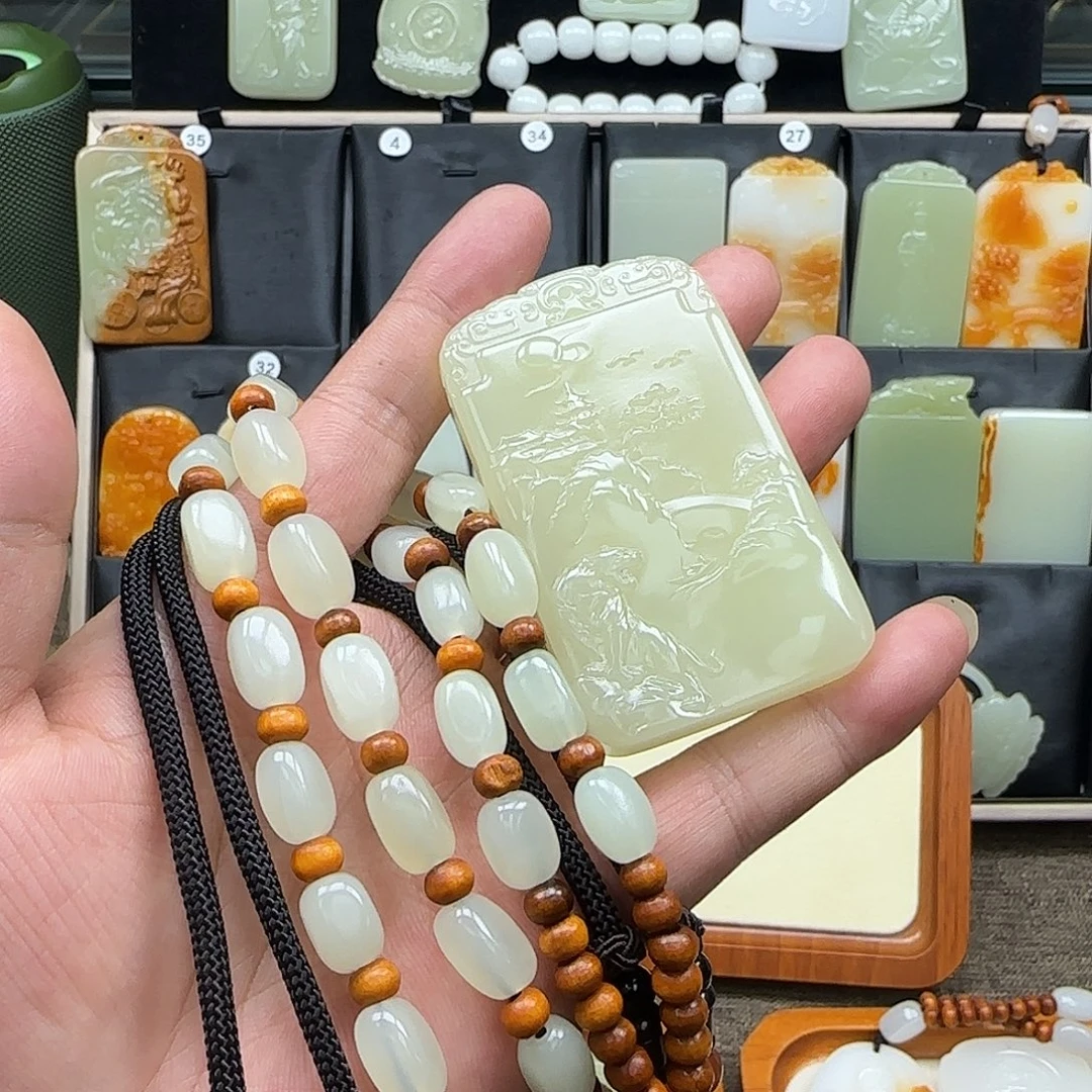 谈***中昆仑山料一物一拍双面虎