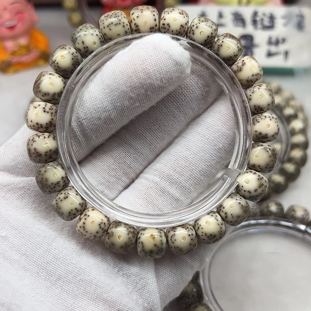 吊坠星月菩提10×9灰包白丹凤眼  206