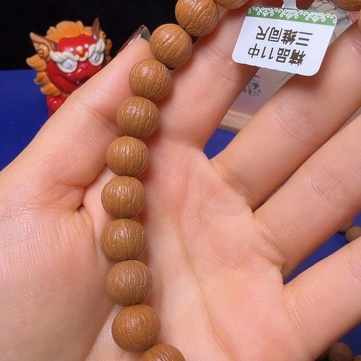 舍****手串猴头核桃凤羽