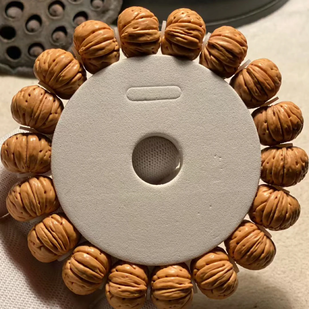 树王纽扣肌肉纹桃核手串