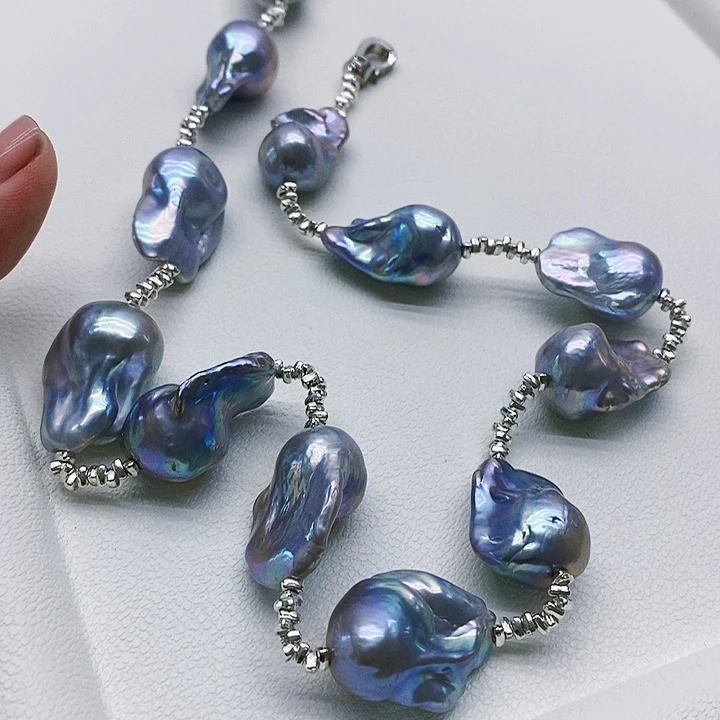 银S925镶嵌淡水珍珠耳饰张***1