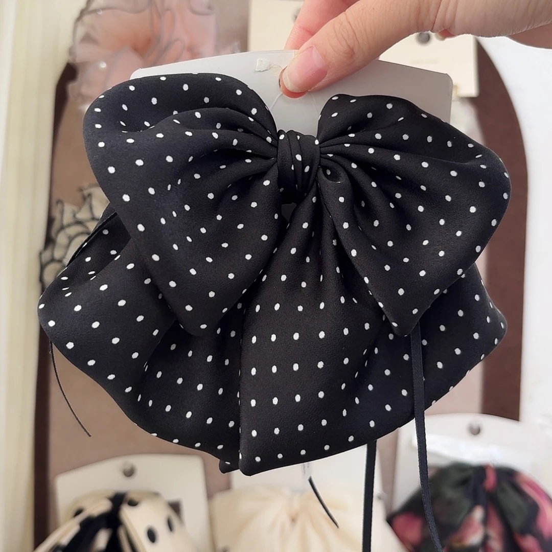 黑白温柔波点抓夹