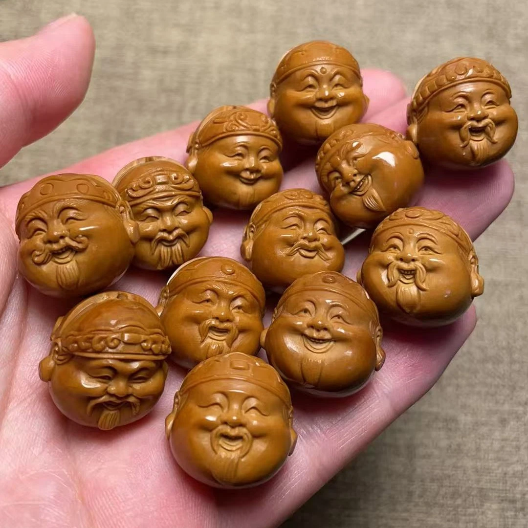 橄榄核雕刻财神头手串