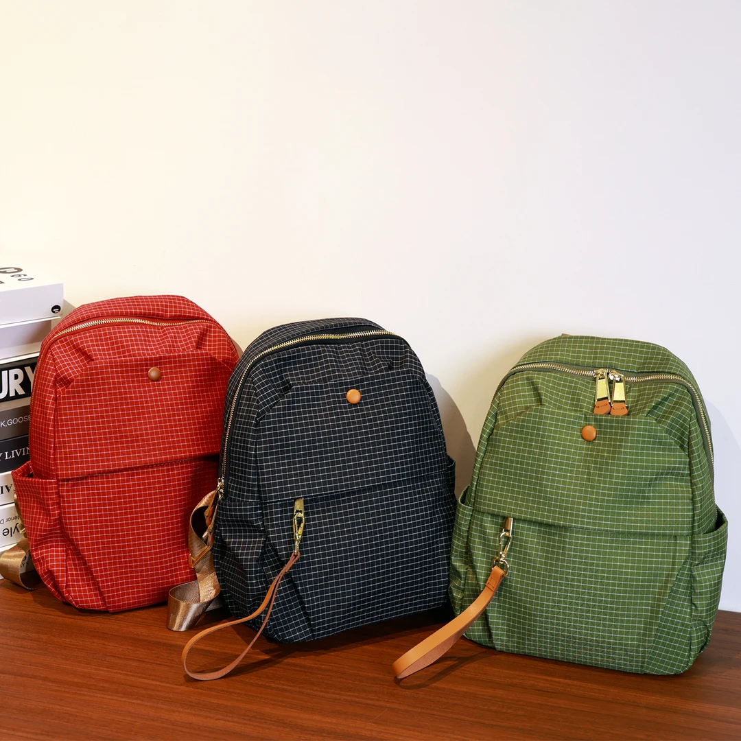 2025新款原创尼龙防水格子双肩包女款休闲百搭通勤单肩背包旅行包