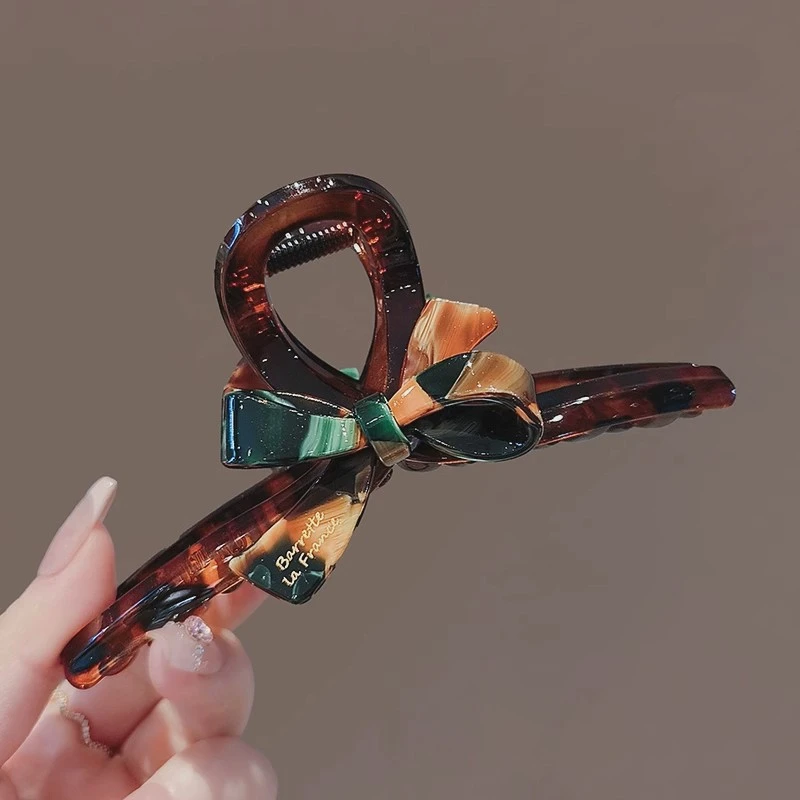 秋冬新款小众设计感撞色蝴蝶结鲨鱼夹气质高马尾抓夹盘发夹子头饰