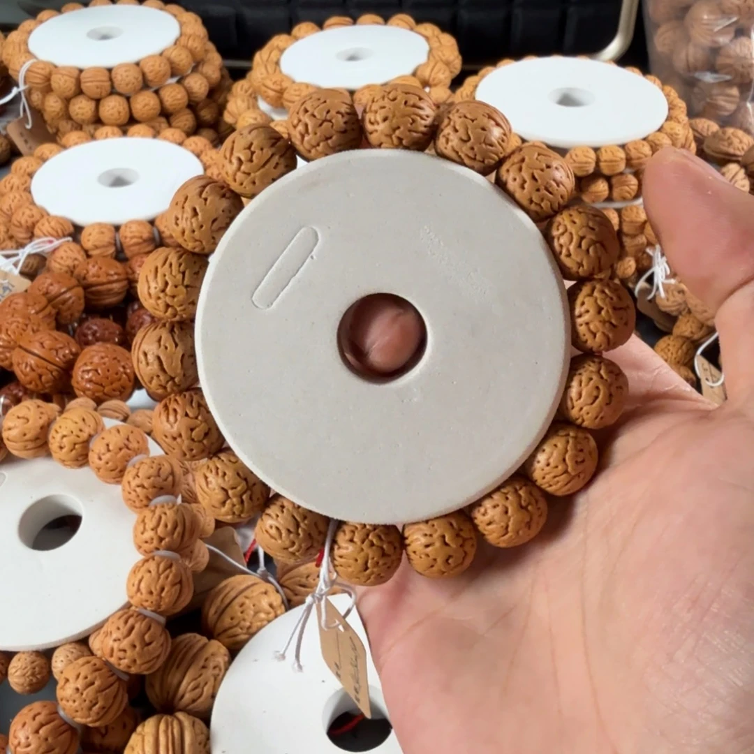 T***3桃核手串14盘锦小金豆