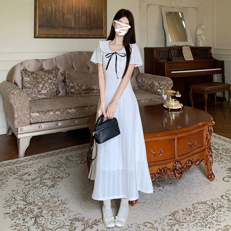 2847法式温柔白色连衣裙夏季新款设计感蝴蝶结白月光收腰显瘦裙子