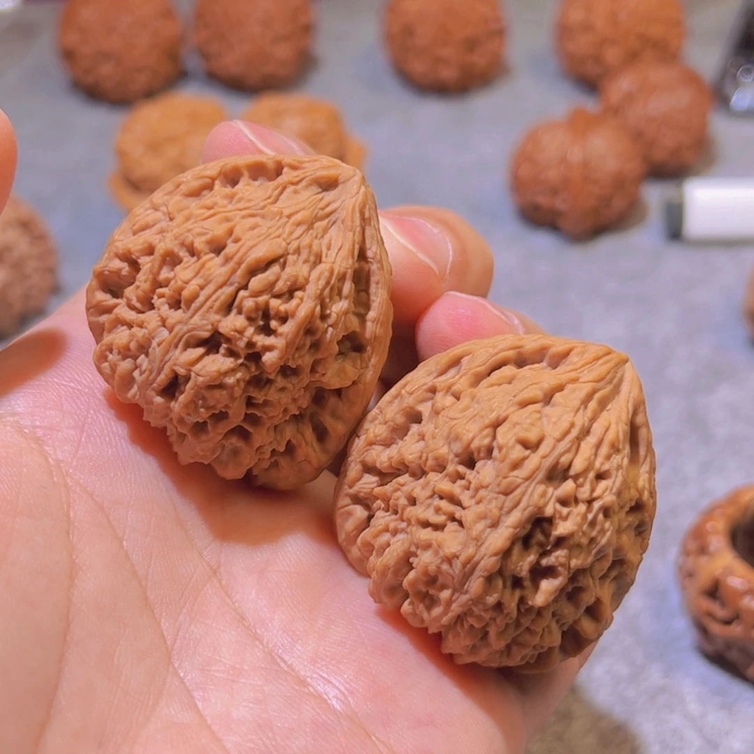 弗***茗桃核把件南疆石核桃