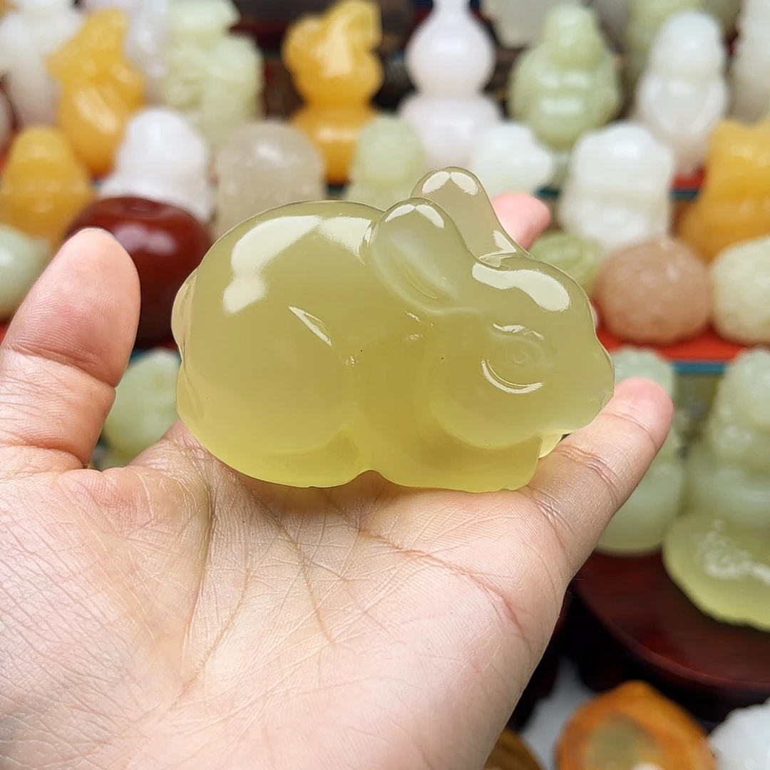 签***记石材兔子手把摆件