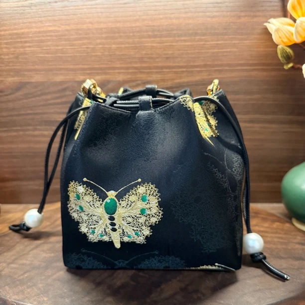 黑金蝴蝶绿宝石款烧麦包 手提包 非遗技艺新中式包包