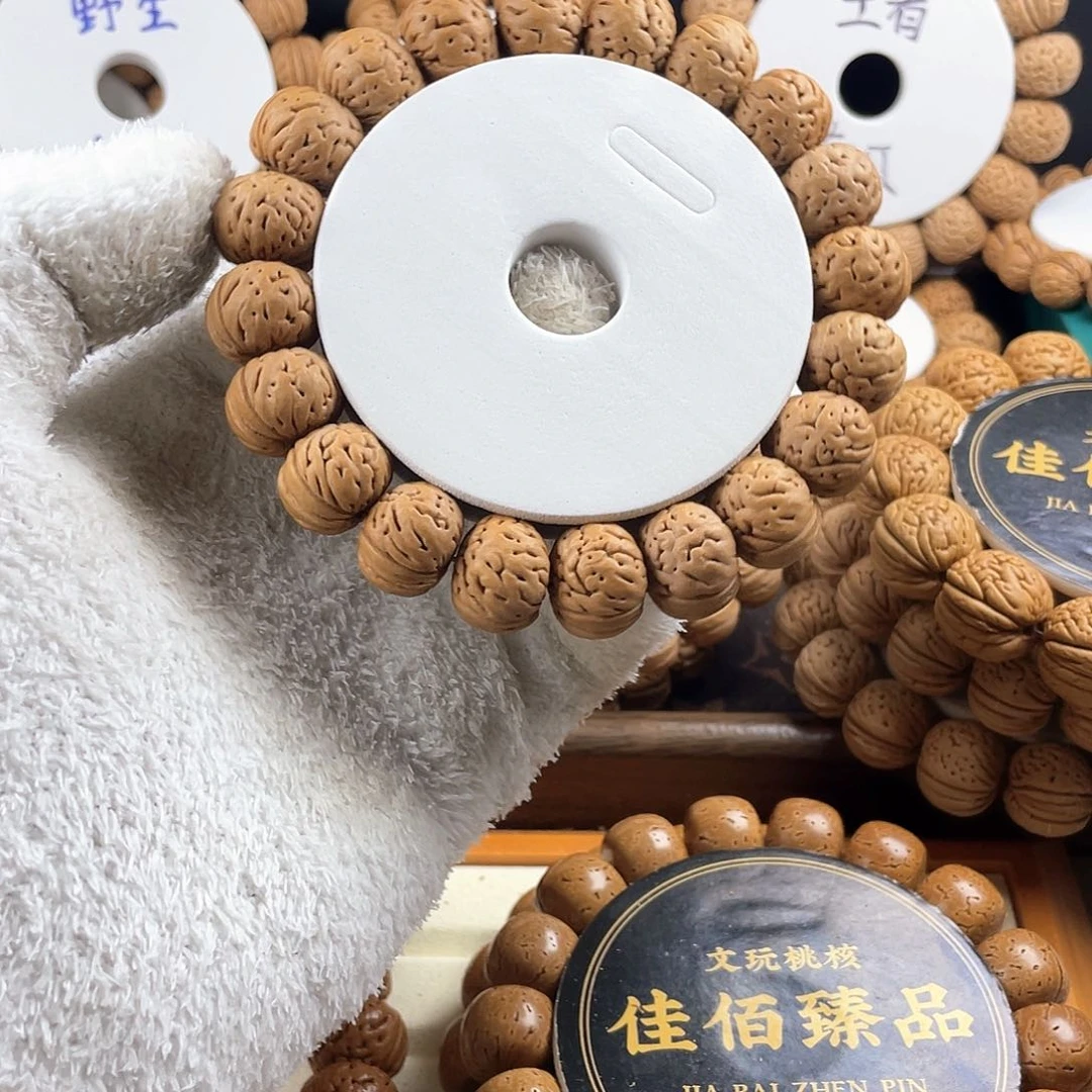 手串桃核?***）一代树王纽扣