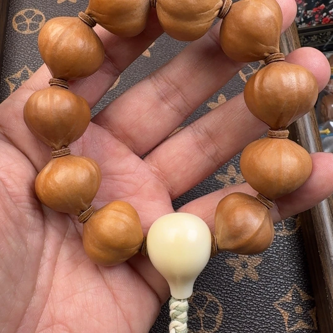 桂***鱼橄榄核手串/手链橄榄