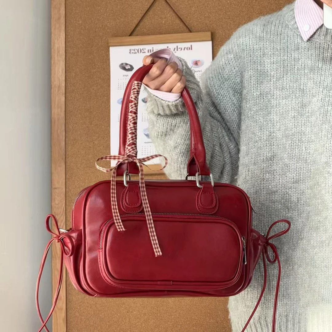 一张同学【长约29宽8高17单位厘米】时尚手提单肩双肩包C3543红