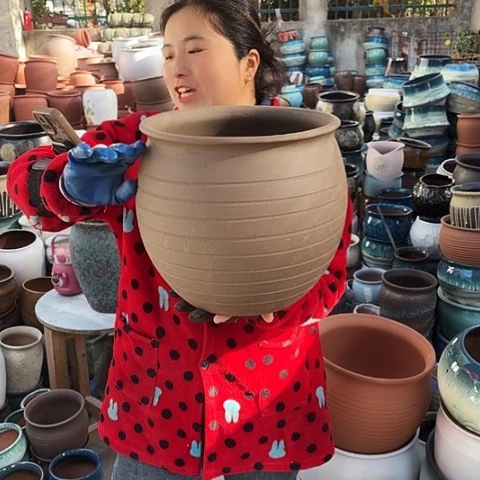 口29高28瑕疵底裂盆子。